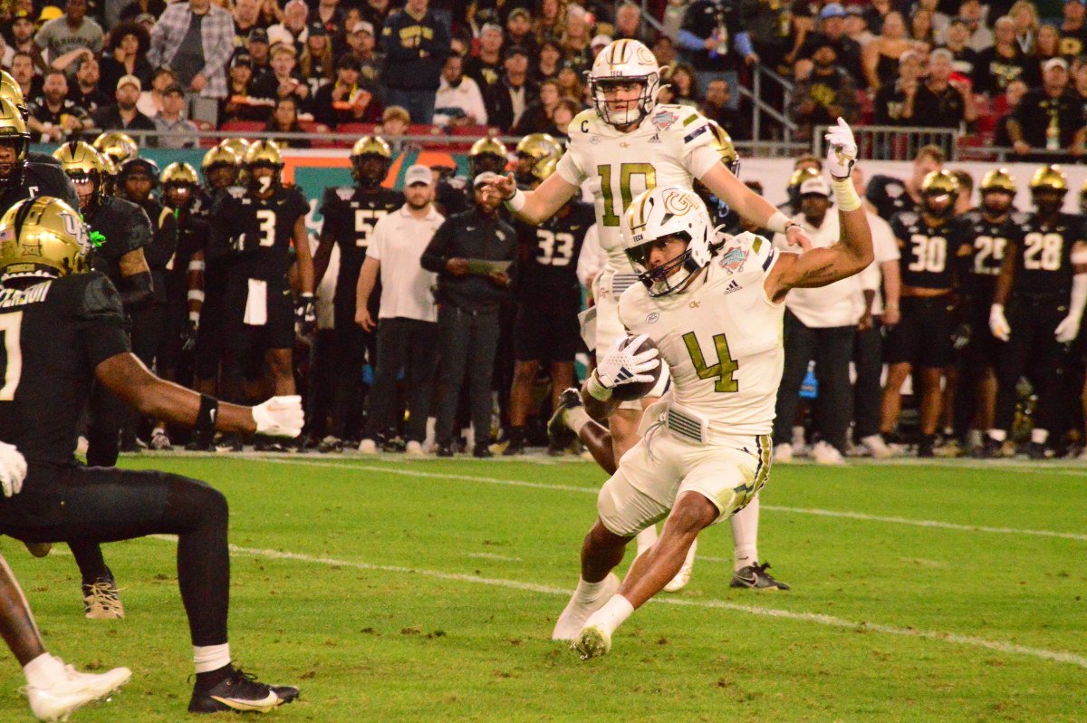 Dontae Smith dodging a UCF defender